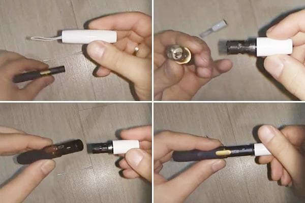 Reinigung des IQOS mit der mitgelieferten Bürste