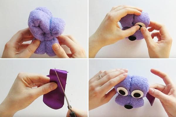 Herstellung einer Welpenfigur aus einem Handtuch und einem Satinband