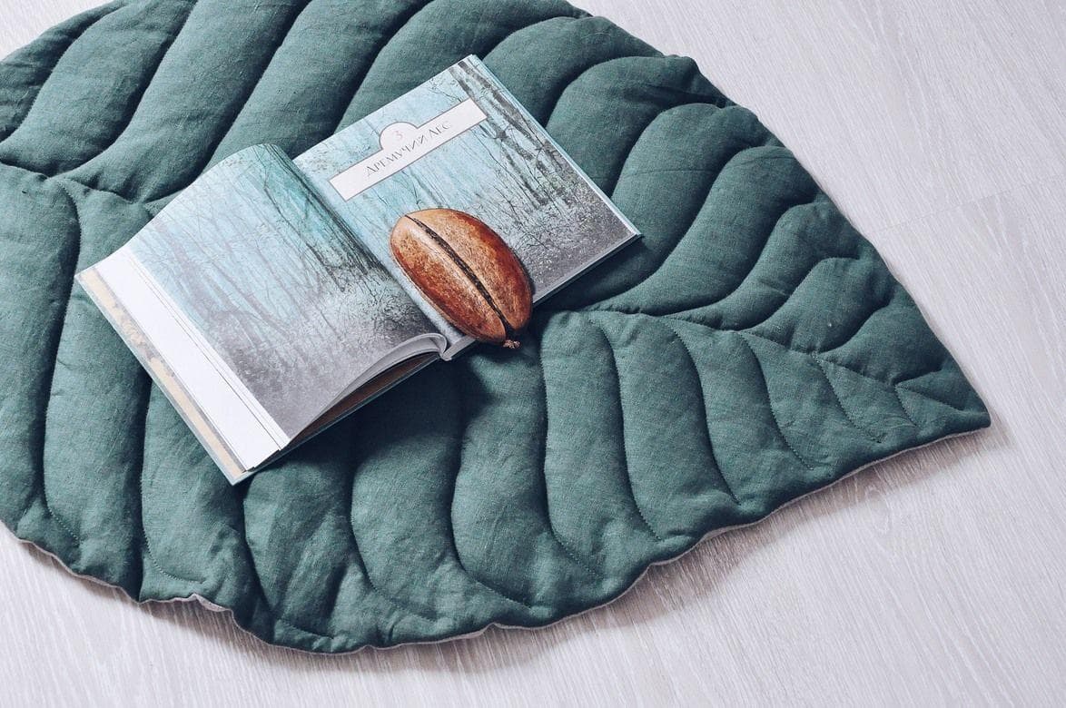 Gesteppter Teppich in Blattform