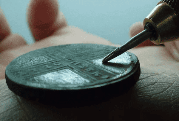 Mechanische Reinigung von Münzen