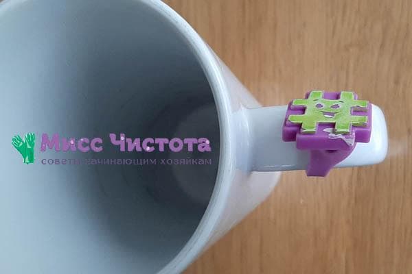 Figur an einer Tasse