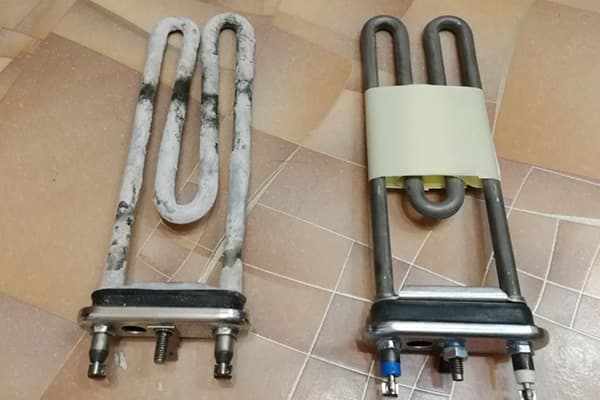 Altes und neues Heizelement einer Waschmaschine